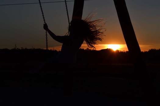 Schaukeln im Sonnenuntergang